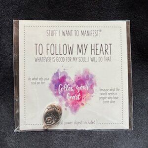 Good luck charms and coins with relevant phrases.